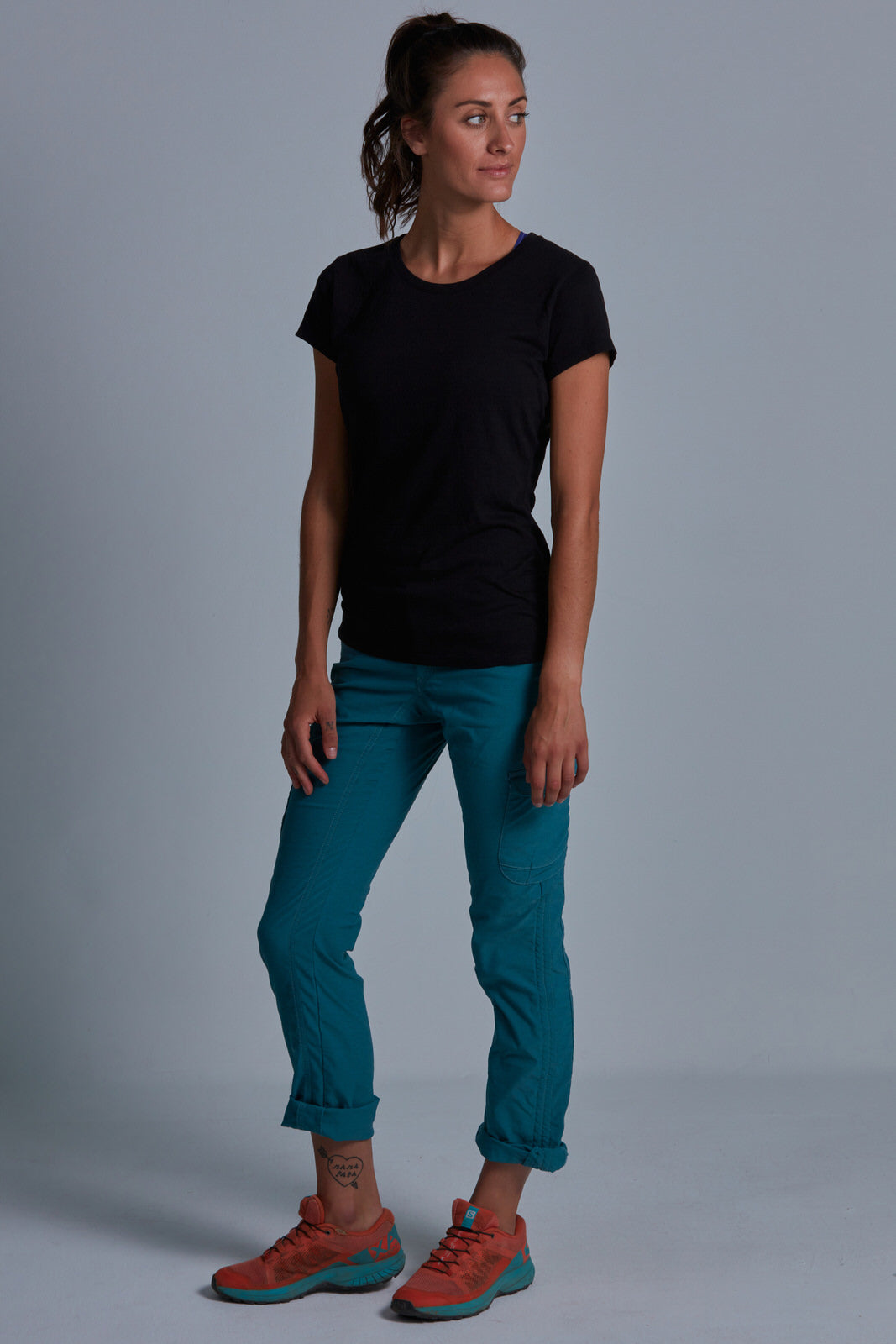 ONNO bamboo t-shirt in Black Unpatched, Christina is 5'9" and wearing size S.