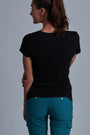 ONNO bamboo t-shirt in Black Unpatched, Christina is 5'9" and wearing size S.