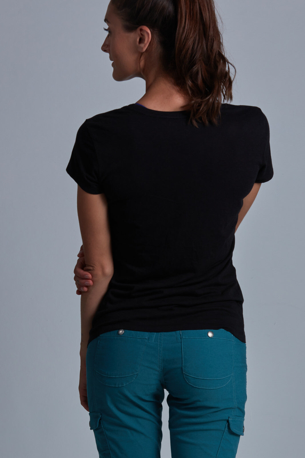 ONNO bamboo t-shirt in Black Unpatched, Christina is 5'9" and wearing size S.