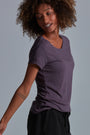 ONNO bamboo t-shirt Dirty Purple Unpatched, Sage is 5'7" and wearing size XS.