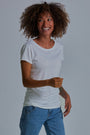 ONNO bamboo t-shirt in Natural Unpatched, Sage is 5'7" and wearing size XS.