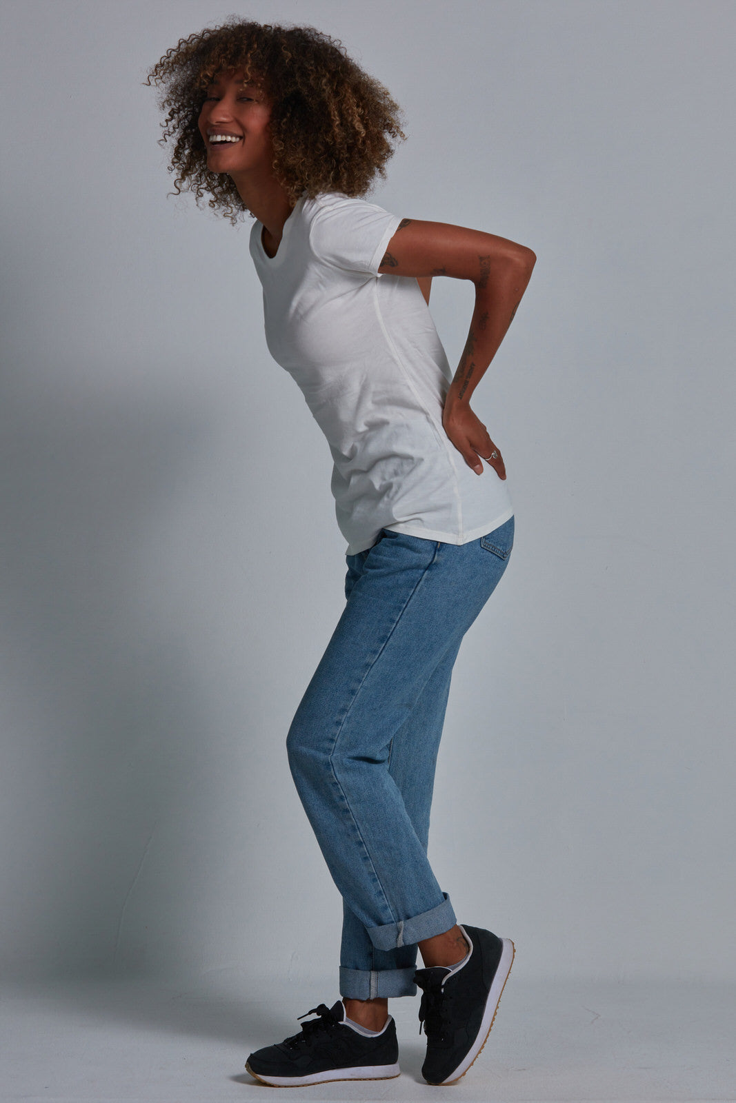 ONNO bamboo t-shirt in Natural Unpatched, Sage is 5'7" and wearing size XS.