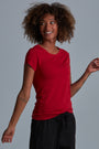 ONNO bamboo t-shirt in Earth Red Unpatched, Sage is 5'7" and wearing size XS.