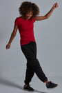ONNO bamboo t-shirt in Earth Red Unpatched, Sage is 5'7" and wearing size XS.