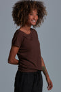 ONNO bamboo t-shirt in Espresso Unpatched, Sage is 5'7" and wearing size XS.