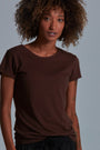 ONNO bamboo t-shirt in Espresso Unpatched, Sage is 5'7" and wearing size XS.