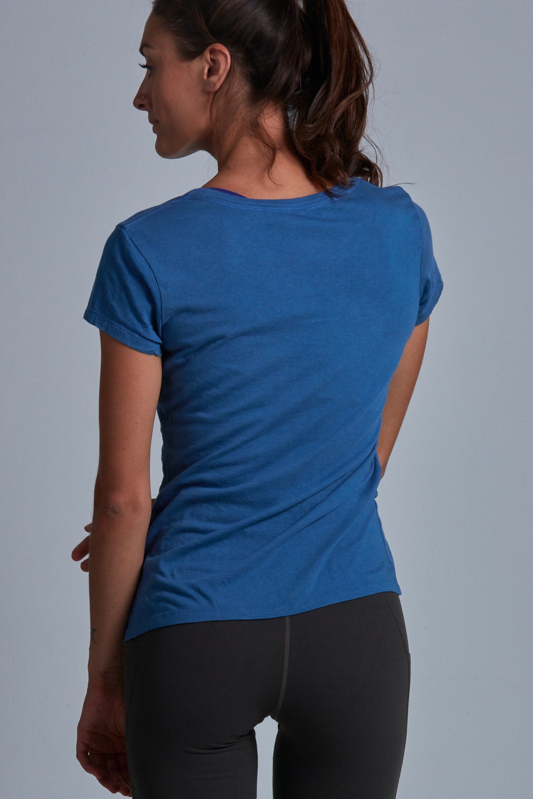 ONNO bamboo t-shirt in Sea Blue Unpatched, Christina is 5'9" and wearing size S.