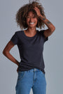 ONNO bamboo t-shirt in Charcoal Blue Unpatched, Sage is 5'7" and wearing size XS.