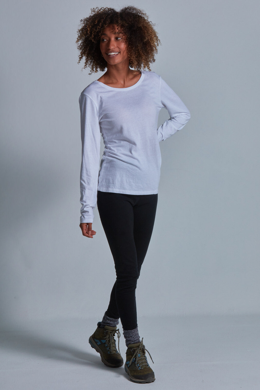 ONNO long sleeve bamboo t-shirt in White Unpatched, Sage is 5'7" and wearing size XS.