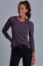 ONNO long sleeve bamboo t-shirt in Dirty Purple Unpatched, Christina is 5'9" and wearing size S.