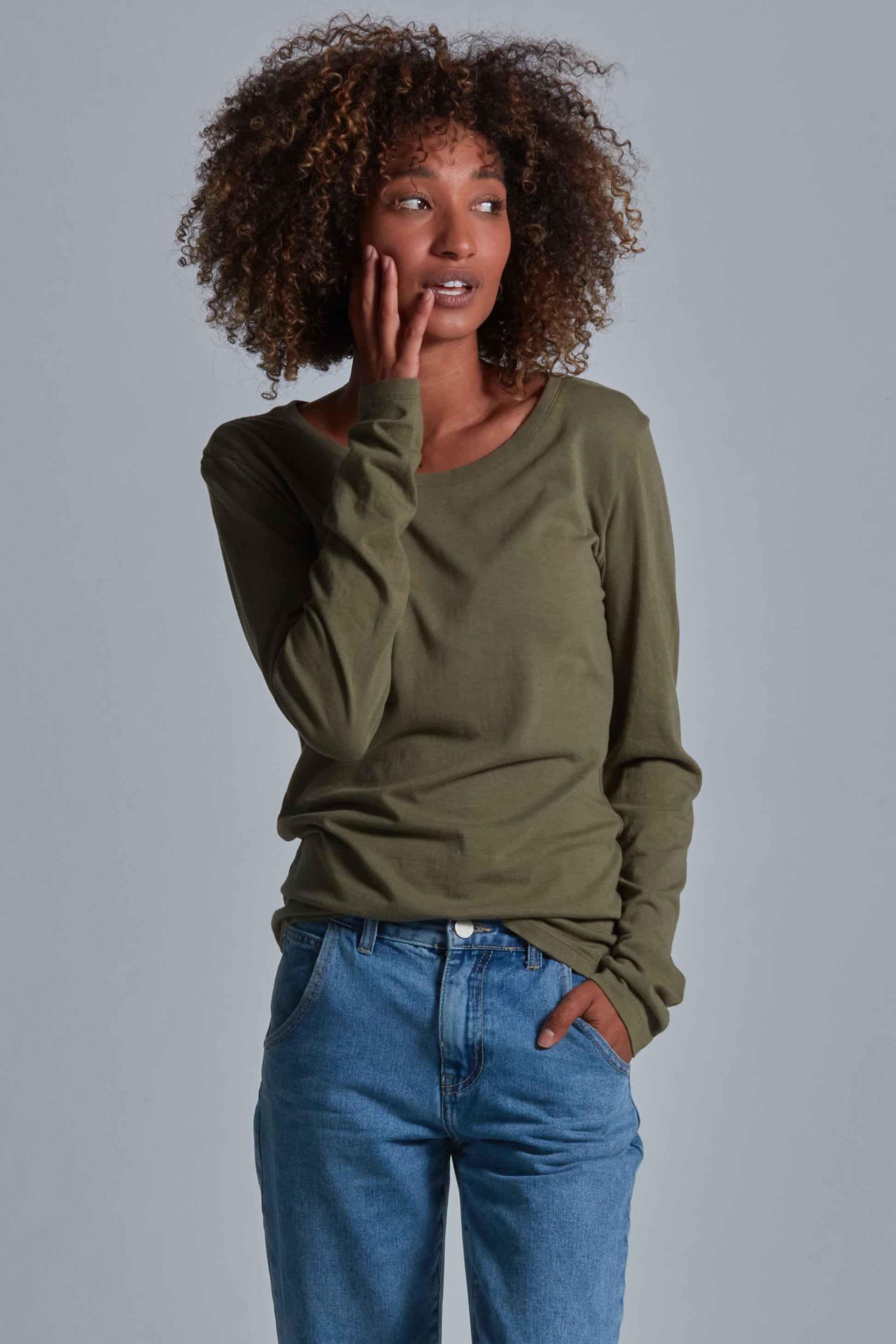 ONNO long sleeve bamboo t-shirt in Cypress Unpatched, Sage is 5'7" and wearing size XS.
