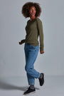 ONNO long sleeve bamboo t-shirt in Cypress Unpatched, Sage is 5'7" and wearing size XS.