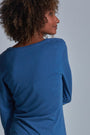 ONNO long sleeve bamboo t-shirt in Sea Blue Unpatched, Sage is 5'7" and wearing size XS.