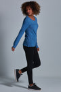 ONNO long sleeve bamboo t-shirt in Sea Blue Unpatched, Sage is 5'7" and wearing size XS.