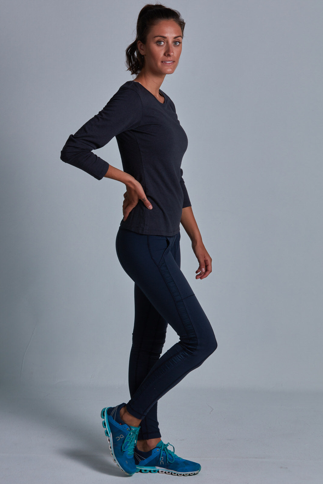 ONNO long sleeve bamboo t-shirt in Charcoal Blue Unpatched, Christina is 5'9" and wearing size S.