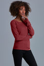 ONNO long sleeve bamboo t-shirt in Brick, Sage is 5'7" and wearing size XS.