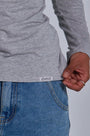 ONNO long sleeve bamboo t-shirt in Heathered Granite, Sage is 5'7" and wearing size XS.