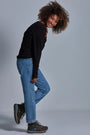 ONNO long sleeve bamboo t-shirt in Black, Sage is 5'7" and wearing size XS.