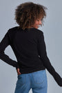 ONNO long sleeve bamboo t-shirt in Black, Sage is 5'7" and wearing size XS.