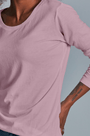 ONNO long sleeve bamboo t-shirt in Pink, Sage is 5'7" and wearing size XS.