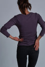 ONNO long sleeve bamboo t-shirt in Dirty Purple, Christina is 5'9" and wearing size S.