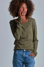 ONNO long sleeve bamboo t-shirt in Cypress, Sage is 5'7" and wearing size XS.