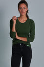 ONNO long sleeve bamboo t-shirt in Moss Green, Christina is 5'9" and wearing size S.