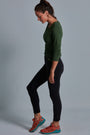ONNO long sleeve bamboo t-shirt in Moss Green, Christina is 5'9" and wearing size S.
