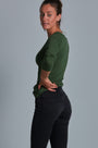 ONNO long sleeve bamboo t-shirt in Moss Green, Christina is 5'9" and wearing size S.