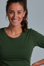 ONNO long sleeve bamboo t-shirt in Moss Green, Christina is 5'9" and wearing size S.
