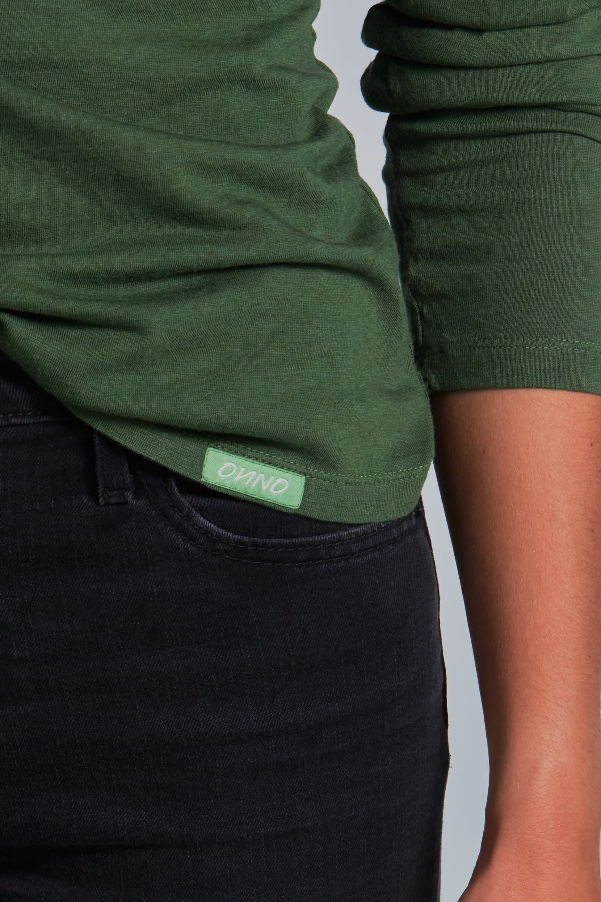 ONNO long sleeve bamboo t-shirt in Moss Green, Christina is 5'9" and wearing size S.