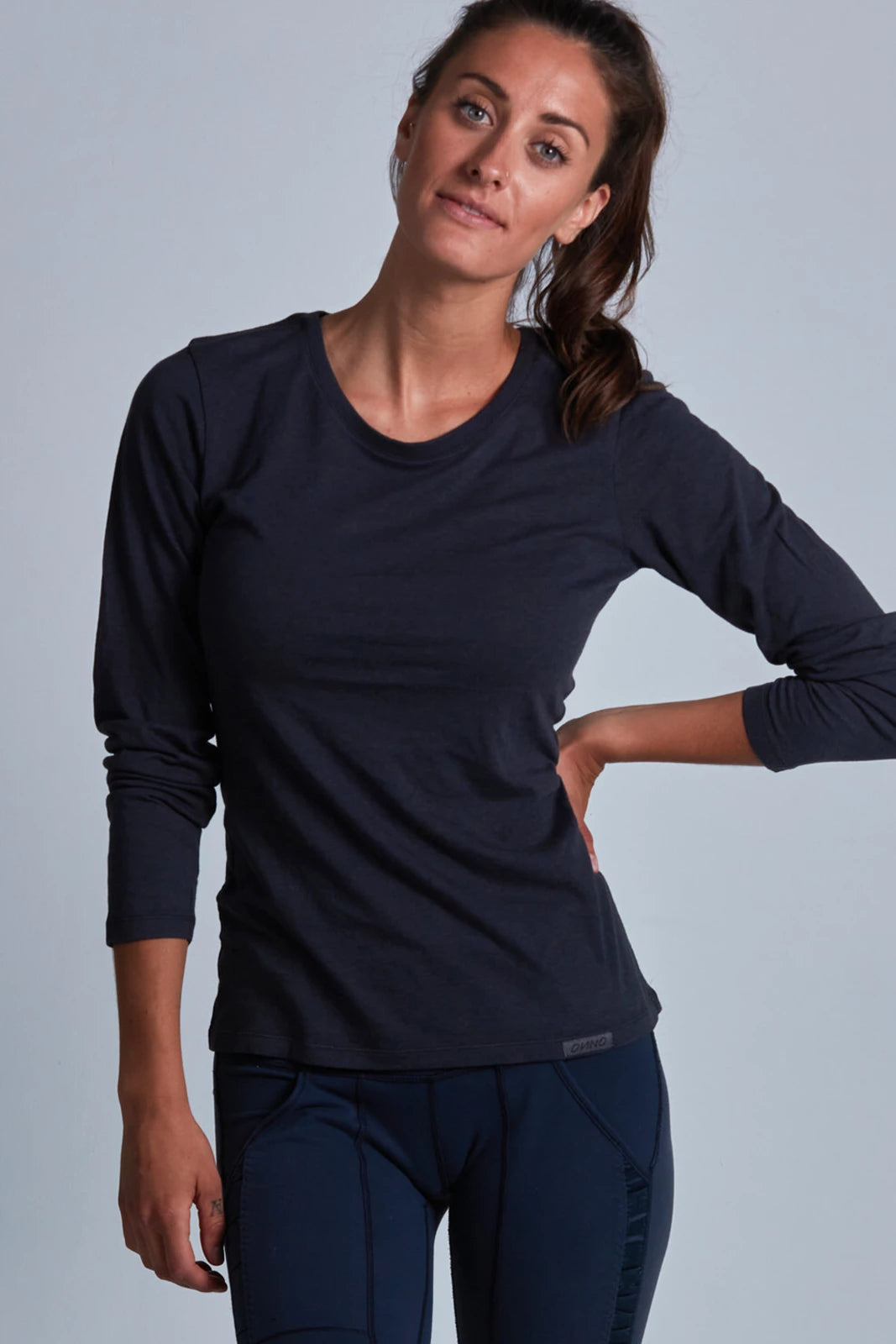 ONNO long sleeve bamboo t-shirt in Charcoal Blue, Christina is 5'9" and wearing size S.
