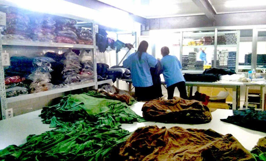 Employees working at the ONNO t-shirt factory in China