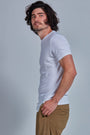 ONNO hemp t-shirt in White, Nic is 5'11" and wearing size M.
