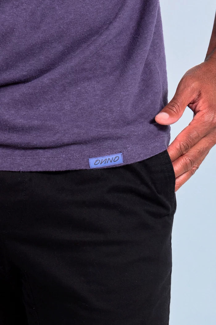 ONNO hemp t-shirt in Dirty Purple, Golden is 6'0" and wearing size L.