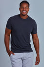 ONNO hemp t-shirt in Slate, Golden is 6'0" and wearing size L.
