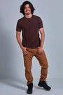 ONNO hemp t-shirt in Espresso, Nic is 5'11" and wearing size M.