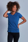 ONNO hemp t-shirt in Earth Blue Unpatched, Sage is 5'7" and wearing size XS.