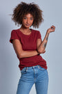ONNO hemp t-shirt in Cardinal Unpatched, Sage is 5'7" and wearing size XS.
