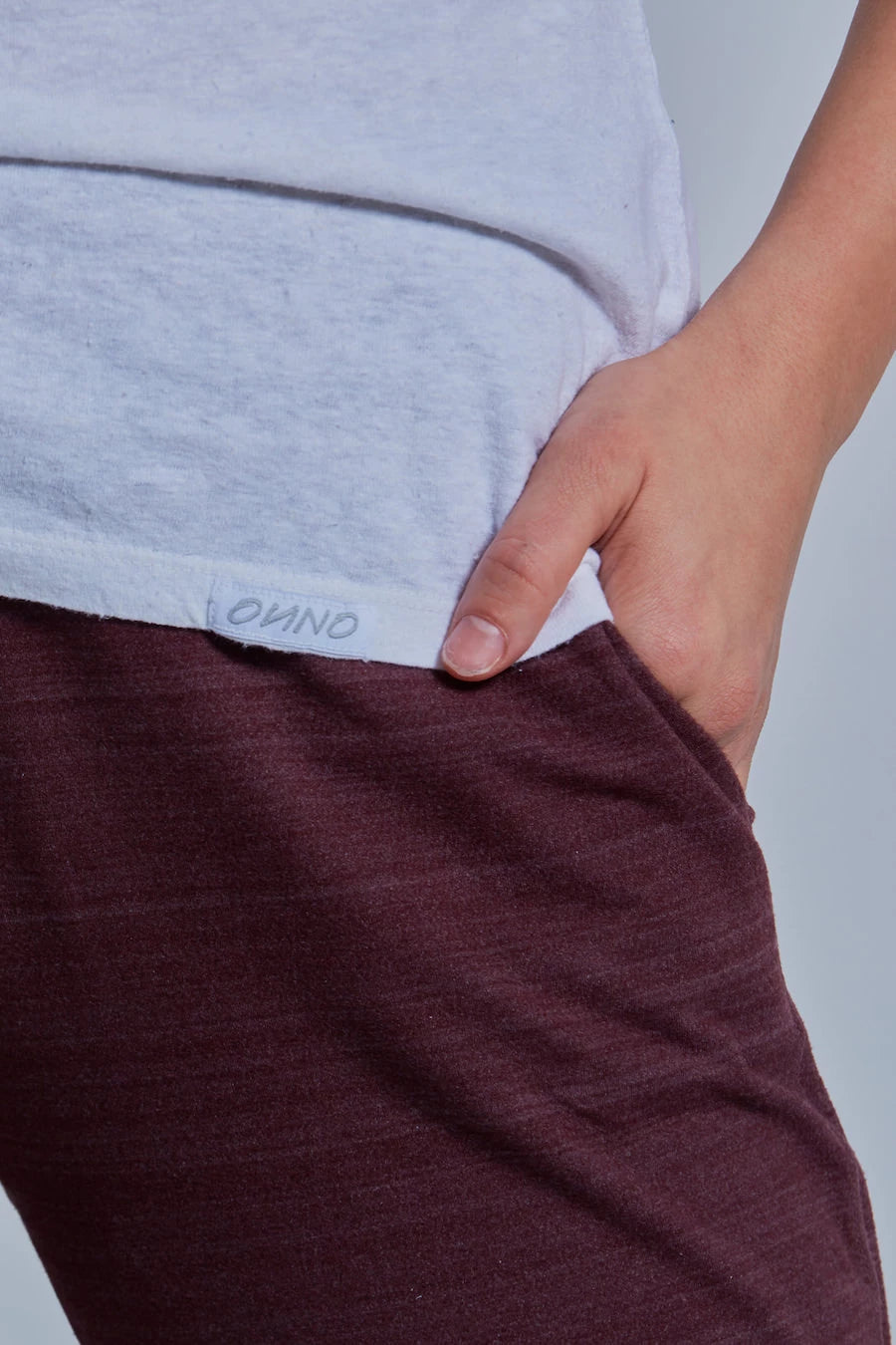 ONNO hemp t-shirt in White, Caroline is 5'8" and wearing size S.