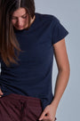 ONNO hemp t-shirt in Lapis, Caroline is 5'8" and wearing size S.
