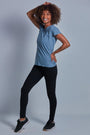 ONNO hemp t-shirt in Steel Blue, Sage is 5'7" and wearing size XS.