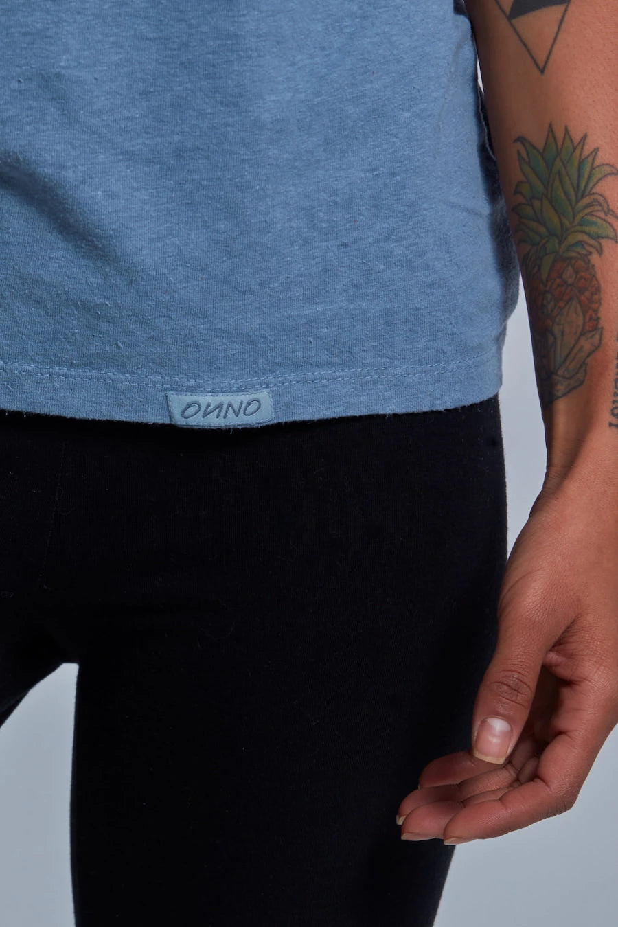 ONNO hemp t-shirt in Steel Blue, Sage is 5'7" and wearing size XS.