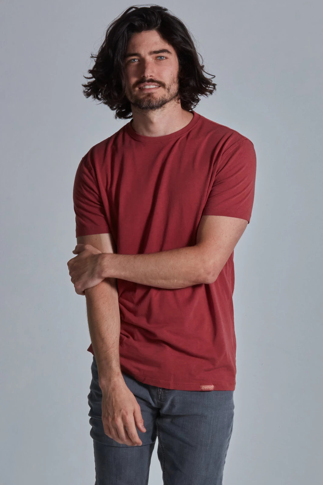 ONNO lyocell bamboo t-shirt in Brick, Nic is 5'11" and wearing size M.