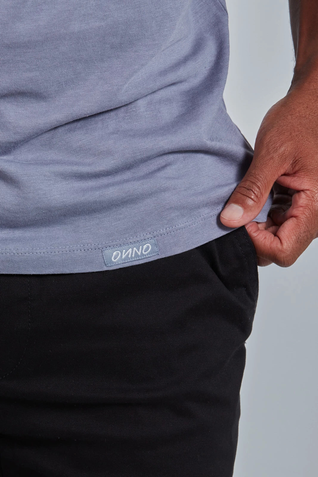 ONNO lyocell bamboo t-shirt in Stone, Golden is 6'0" and wearing size L.