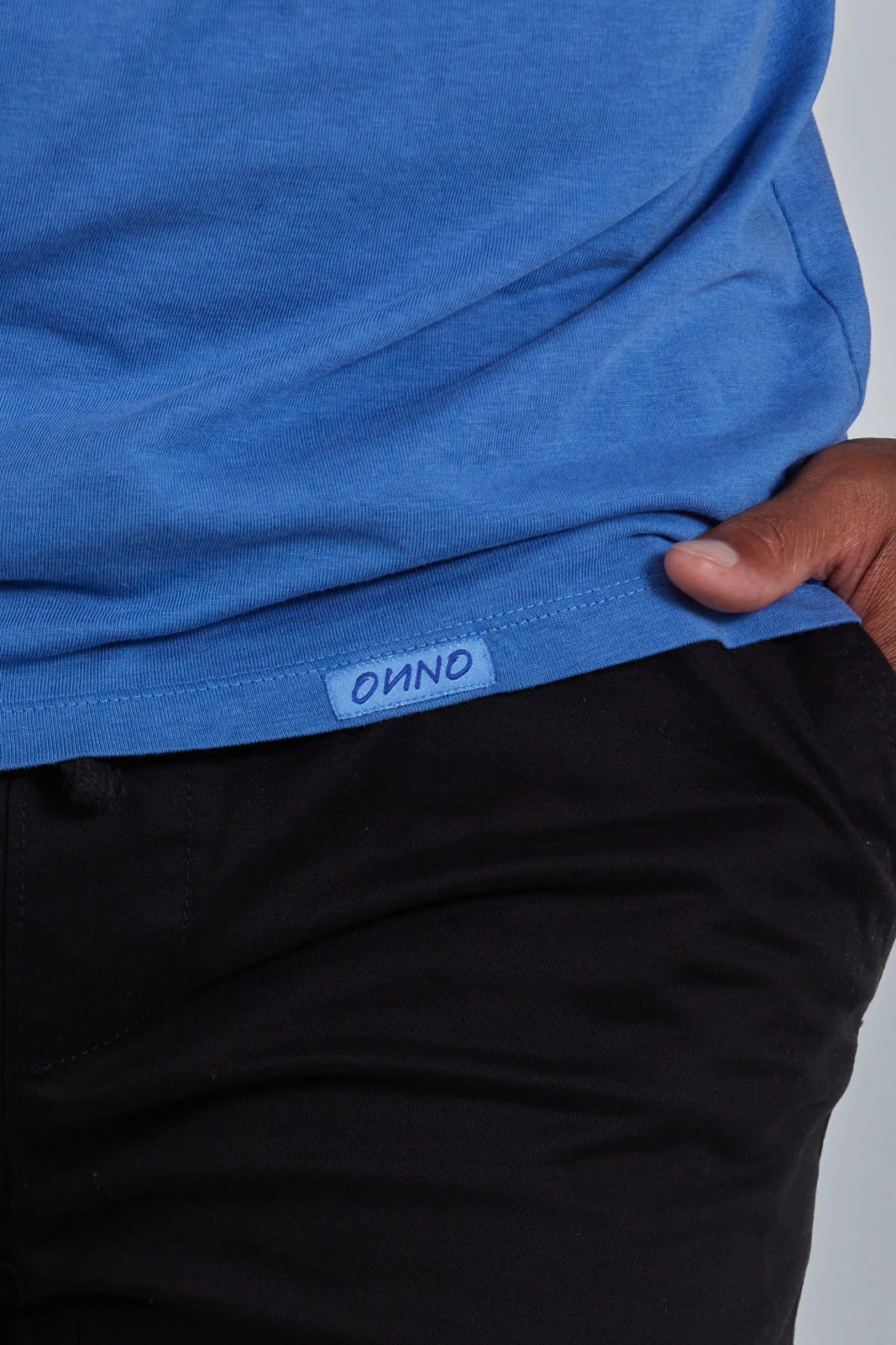 ONNO lyocell bamboo t-shirt in Blue Ink, Golden is 6'0" and wearing size L.