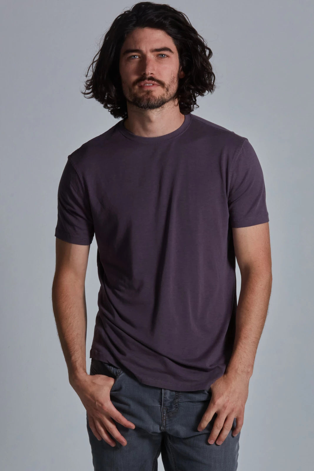 ONNO lyocell bamboo t-shirt in Dirty Purple, Nic is 5'11" and wearing size M.