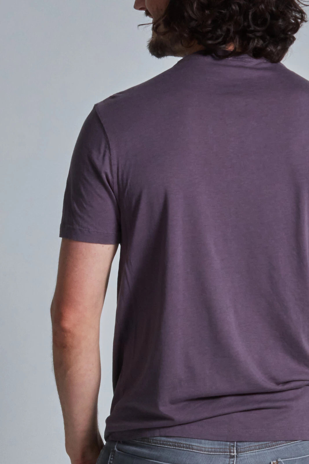 ONNO lyocell bamboo t-shirt in Dirty Purple, Nic is 5'11" and wearing size M.
