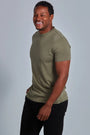 ONNO lyocell bamboo t-shirt in Cypress, Golden is 6'0" and wearing size L.