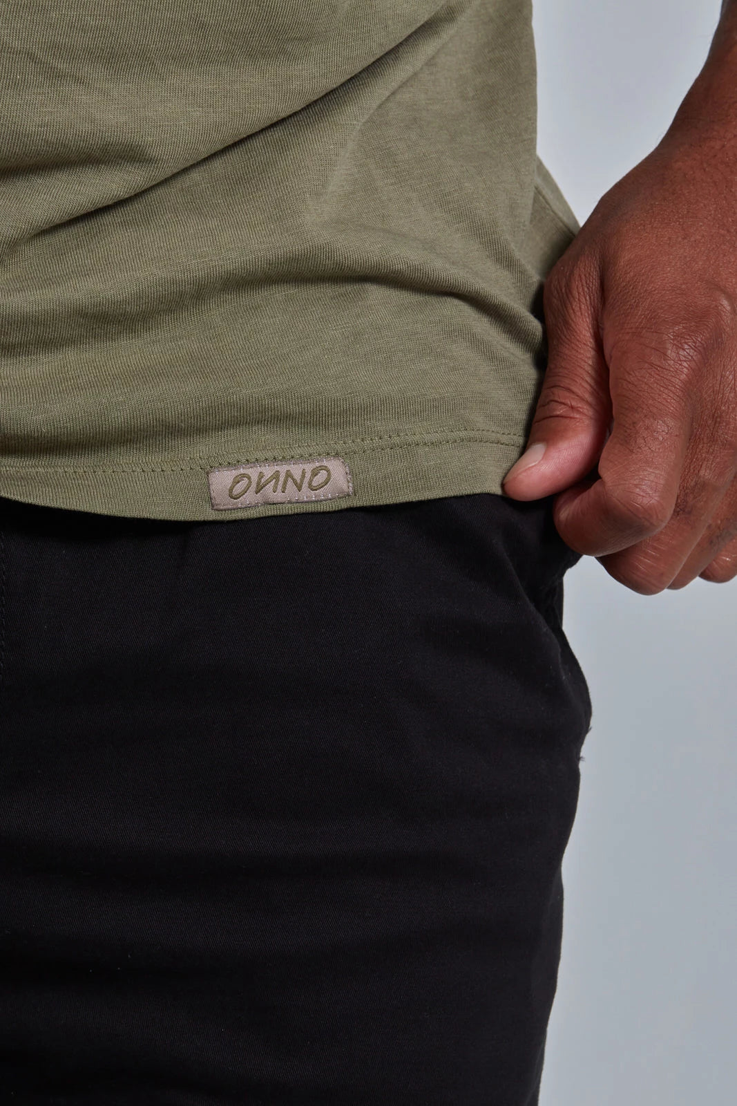ONNO lyocell bamboo t-shirt in Cypress, Golden is 6'0" and wearing size L.